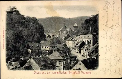 Ak Krupka Graupen Reg. Aussig, Straßenpartie im Ort, Kirche