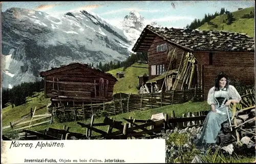 Ak Mürren Kanton Bern, Partie an den Alphütten, Frau in Schweizer Tracht