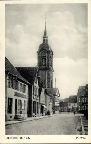 Ak Reichshoffen Reichshofen Elsass Bas Rhin, Straßenpartie mit Blick auf die Kirche