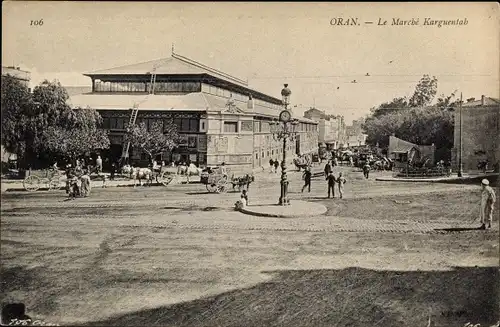 Ak Oran Algerien, Le Marché Karguentah, Straßenkreuzung mit Passanten