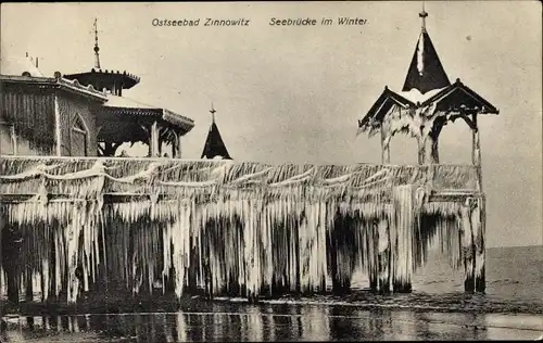 Ak Ostseebad Zinnowitz auf Usedom, vereiste Seebrücke im Winter