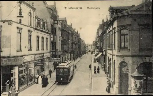 Ak Wilhelmshaven in Niedersachsen, Marktstraße, Straßenbahn, Litfaßsäule