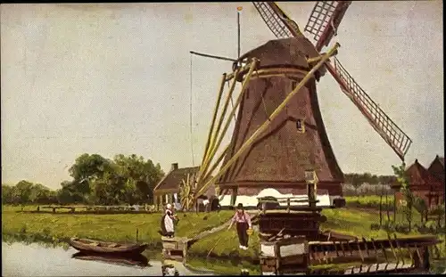 Ak Niederlande, Windmühle am Wasser