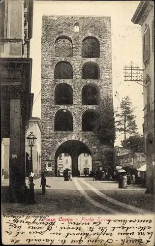 Ak Como Lombardia Italien, Porta Torre, Straßenpartie mit Blick auf ein Tor
