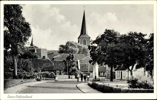 Ak Esens in Ostfriesland, Straßenansicht mit Kirche