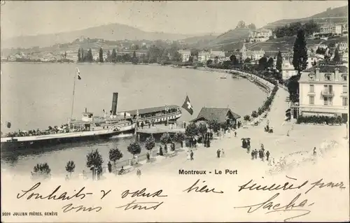 Ak Montreux Kanton Waadt,Teilansicht der Stadt mit Hafen und einem Boot Bonivard