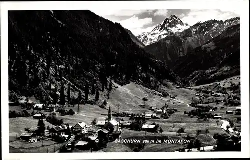 Ak Gaschurn in Vorarlberg, Ortsansicht im Montafon, Kirche