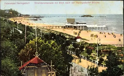 Ak Ostseebad Heringsdorf auf Usedom, Strandpromenade mit Blick nach der Heringsdorfer Brücke