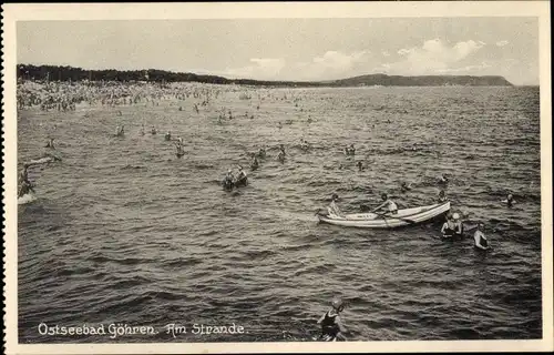 Ak Ostseebad Göhren auf Rügen, Am Strande, Menschen im Meer, Boot