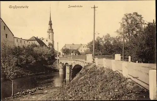 Ak Großpostwitz in Sachsen, Spreebrücke, Kirche