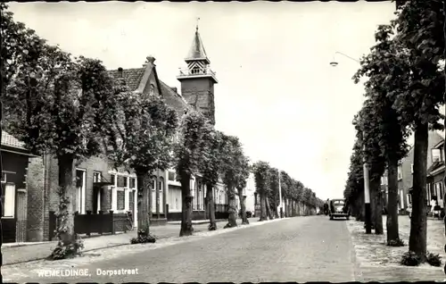 Ak Wemeldinge Zeeland Niederlande, Dorpsstraat, Turm