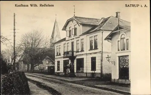 Ak Satrup in Angeln, Straßenpartie mit Kaufhaus