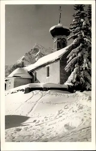 Ak Gargellen Montafon Vorarlberg, Kirche im Schnee