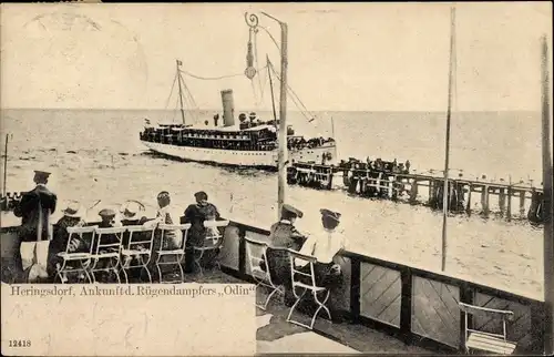 Ak Ostseebad Heringsdorf auf Usedom, Ankunft des Rügendampfers Odin, Terrasse