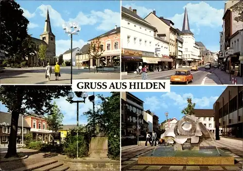 Ak Hilden im Rheinland, Ortspartie, Straßenpartie, Monument, Springbrunnen