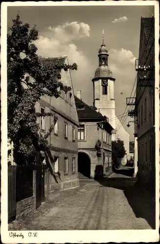 Ak Ostritz in der Oberlausitz, Straßenpartie zur Kirche