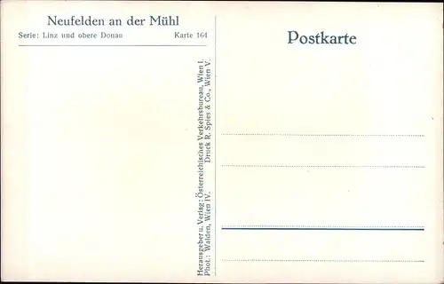 Ak Neufelden im Mühlviertel Oberösterreich, Straßenpartie, Brunnen