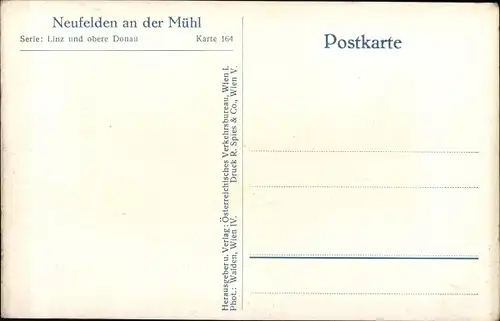 Ak Neufelden im Mühlviertel Oberösterreich, Straßenpartie, Brunnen