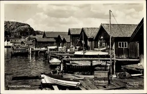 Ak Hunnebostrand Schweden, Partie am Hafen, Boote, Häuser