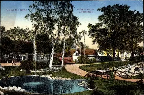 Ak Ostseebad Ahlbeck Heringsdorf auf Usedom, Anlagen an der Lindenstraße, Teich, Fontäne, Brücke