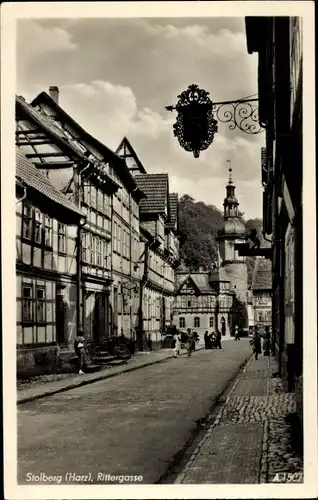 Ak Stolberg im Harz, Rittergasse, Hotel, Fachwerkhäuser, Kirchturm, Passanten