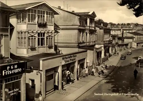 Ak Ostseebad Heringsdorf auf Usedom, Friedenstraße, PGH Friseure, Wirtschafts-Haus Alfred Freund