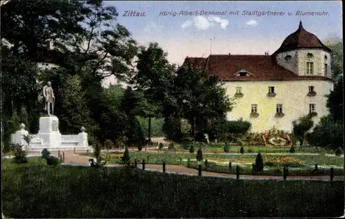 Ak Zittau in der Oberlausitz, König Albert Denkmal m. Stadtgärtnerei u. Blumenuhr