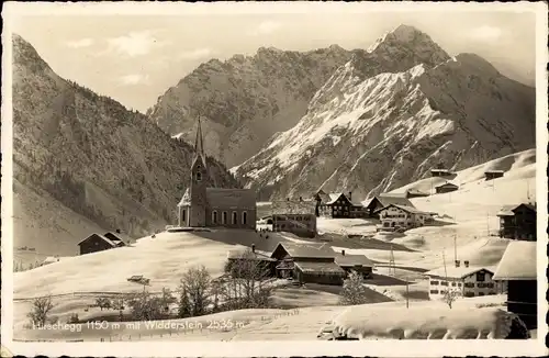 Ak Hirschegg Mittelberg im Kleinwalsertal Vorarlberg, Totalansicht mit Widderstein, Winterszene