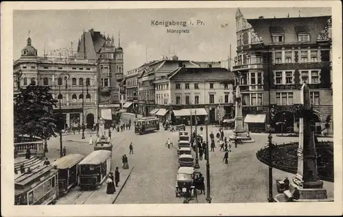 Ak Kaliningrad Königsberg Ostpreußen, Münzplatz, Geschäft, Inh. C. Hübner, Straßenbahnen