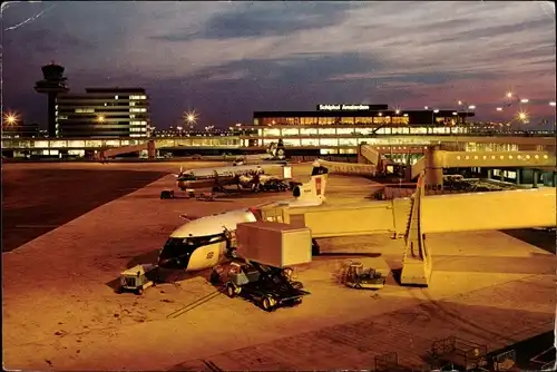 Ak Amsterdam Nordholland Niederlande, International Airport Schiphol, Nachtaufnahme
