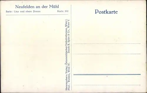 Ak Neufelden im Mühlviertel Oberösterreich, Straßenpartie, Brunnen