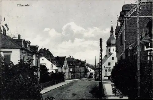 Ak Olbernhau im Erzgebirge, Straßenpartie mit Kirche