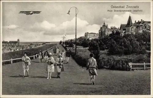 Ak Ostseebad Zinnowitz auf Usedom, Neue Strandpromenade (westlich), Flugzeug