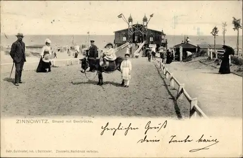 Ak Zinnowitz Usedom, Strand mit Seebrücke, Esel, Kinder