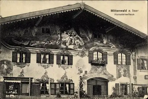 Ak Mittenwald in Oberbayern, Hornsteinerhaus, Geschäft, Fassadenbemalung