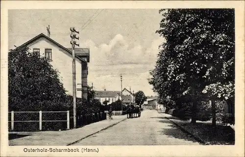 Ak Osterholz Scharmbeck in Niedersachsen, Straßenpartie mit Pferdefuhrwerk