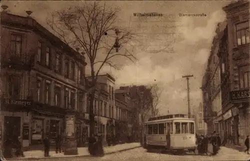 Ak Wilhelmshaven an der Nordsee, Straßenbahn in der Bismarckstraße, Litfaßsäule