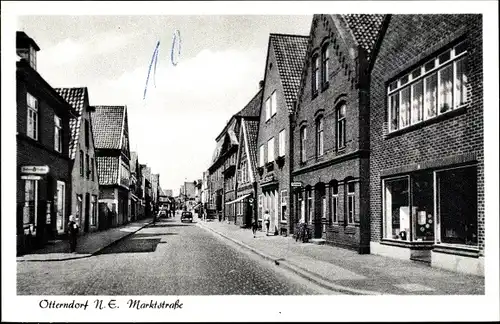 Ak Otterndorf in Niedersachsen, Marktstraße, Kopfsteinpflaster, Häuserreihe