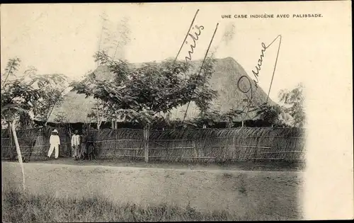 Ak Dahomey Benin, Eine einheimische Hütte mit Palisade