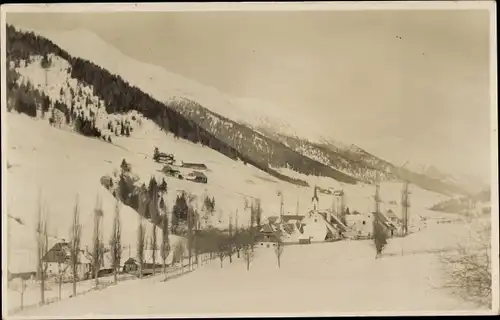 Foto Ak Sankt Johann in Tirol, Ort im Winter