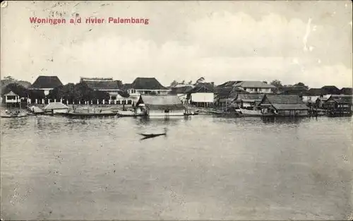 Ak Palembang Sumatra Indonesien, Woningen a/d rivier Palembang