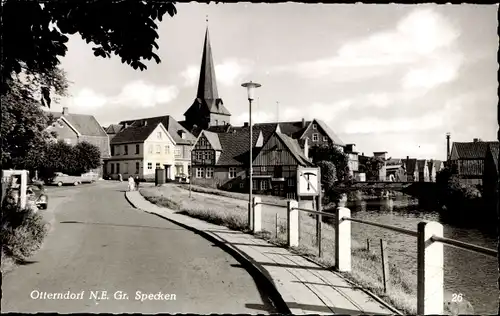 Ak Otterndorf an der Niederelbe, Specken, Straßenpartie, Kirche