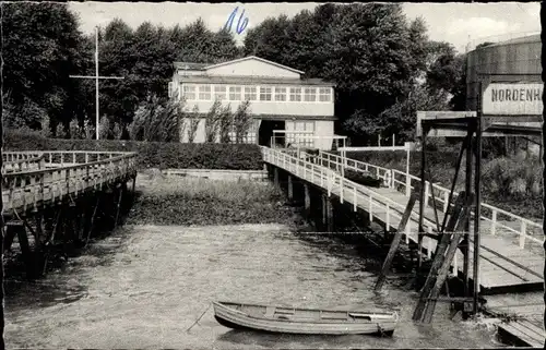 Ak Nordenham in Oldenburg Niedersachsen, Bootshaus an der Weser, Steg