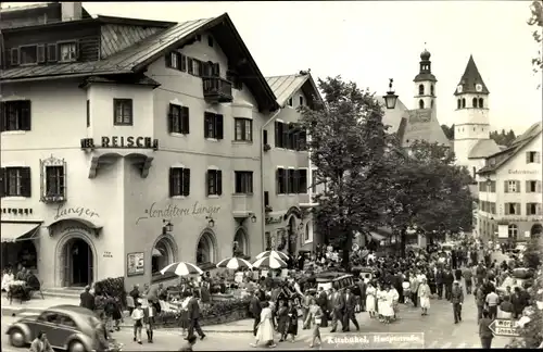 Ak Kitzbühel in Tirol, Hauptstraße, Hotel Reisch, Conditorei Langer