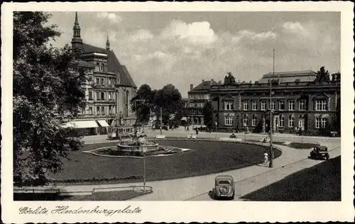 Ak Görlitz in der Lausitz, Partie am Hindenburgplatz, Straßenbahn, Autos,  Brunnen