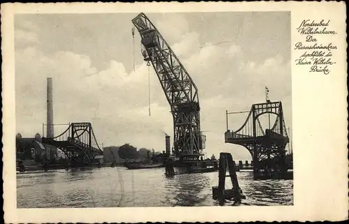 Ak Wilhelmshaven an der Nordsee, Riesenschwimmkran durchfährt die Kaiser-Wilhelm-Brücke