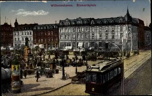 Ak Wilhelmshaven an der Nordsee, Bismarckplatz, Straßenbahn, Litfaßsäule, Denkmal