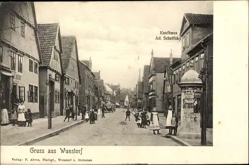 Ak Wunstorf in Niedersachsen, Straßenpartie, Kaufhaus Ad. Scheffsky, Litfaßsäule