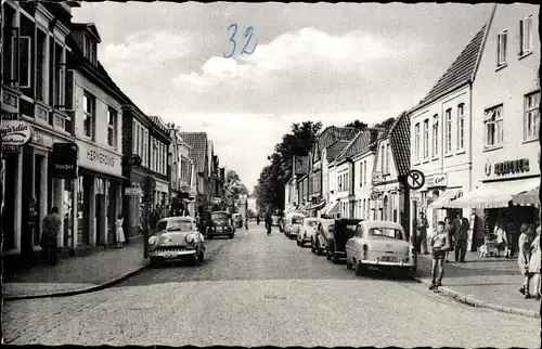 Ak Aurich in Ostfriesland, Norderstraße, Geschäfte, Autos