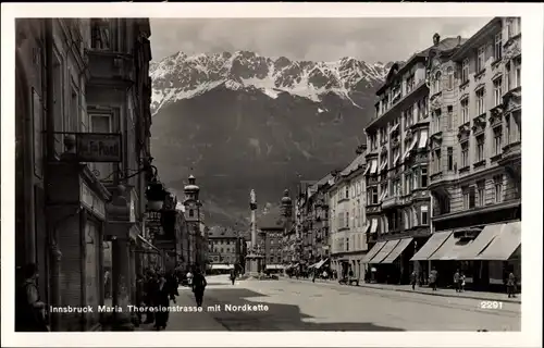 Ak Innsbruck in Tirol, Maria Theresienstraße mit Nordkette, Annasäule, Geschäfte